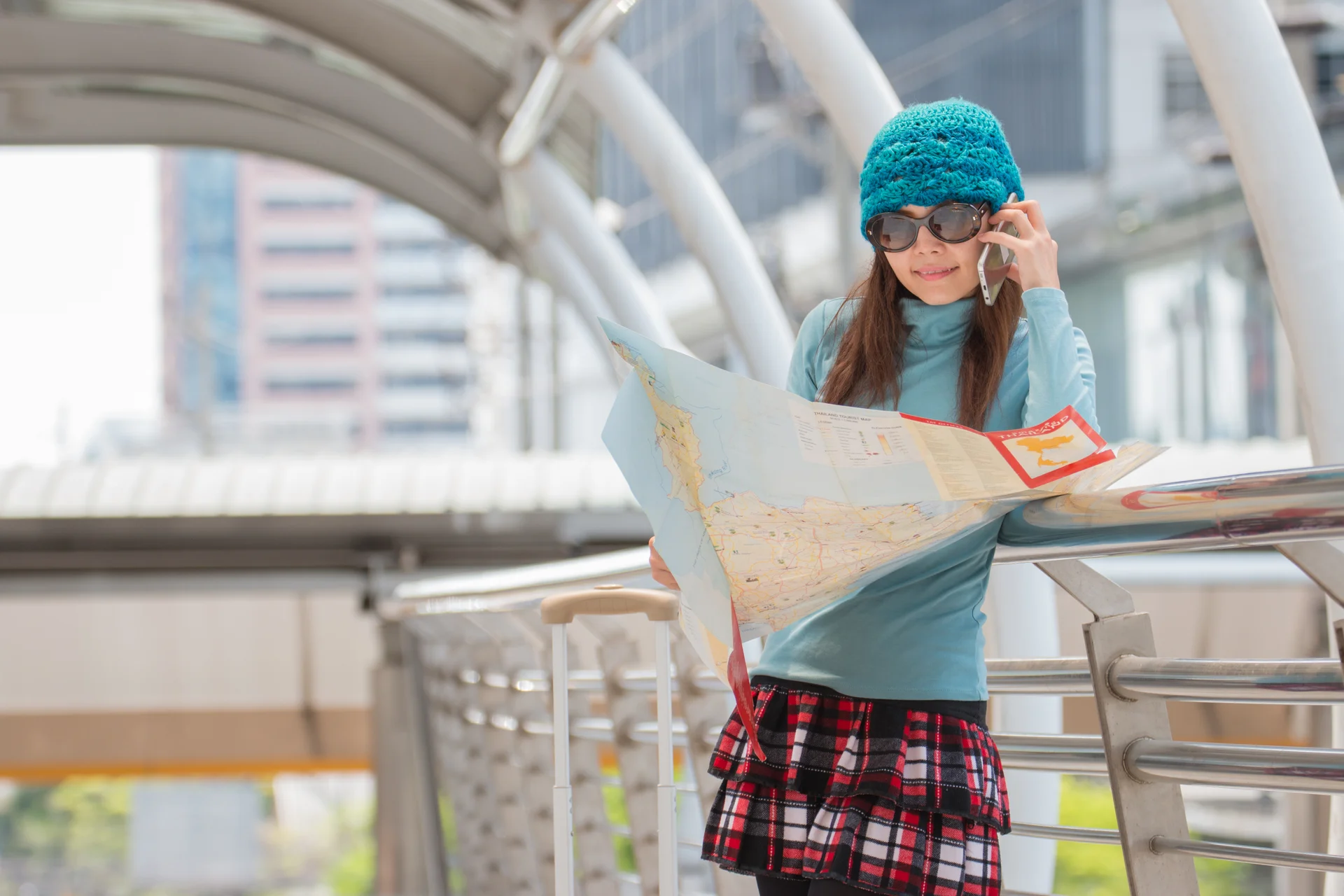 Asia woman look searching direction on location map