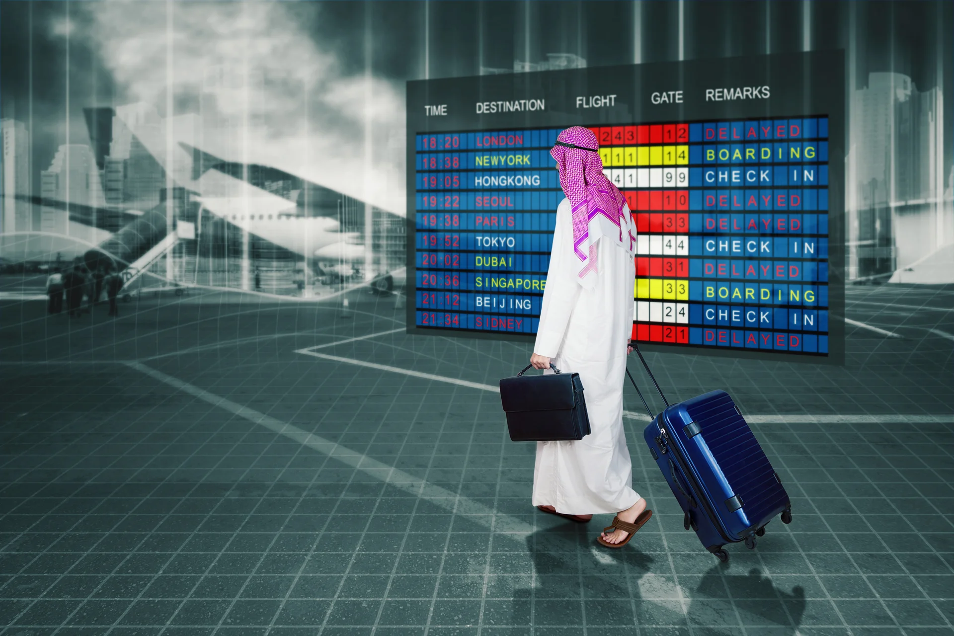 Middle eastern businessman in a business trip Carrying a suitcase in the airport with flight schedule board