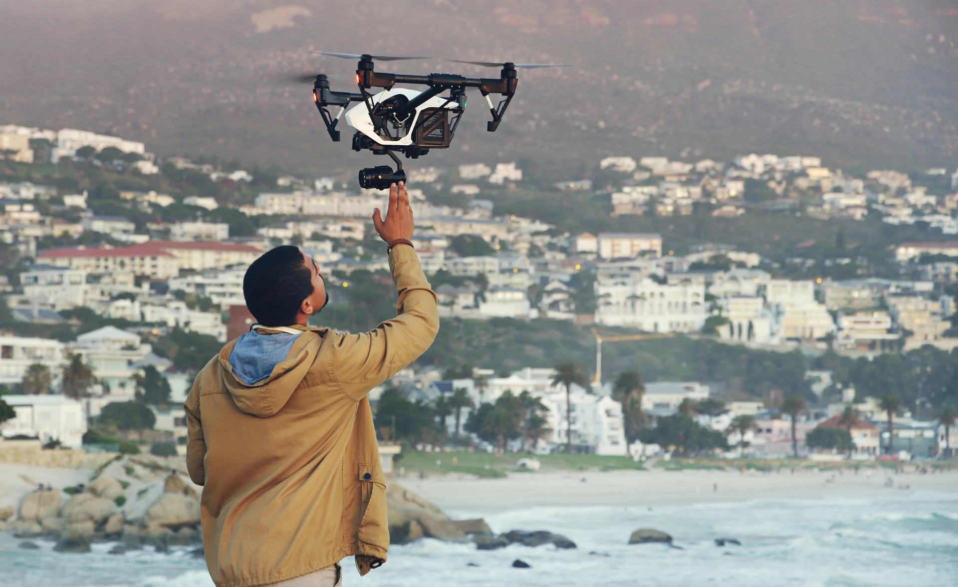 Hes sky high of belief Shot of a young man flying his drone outdoors